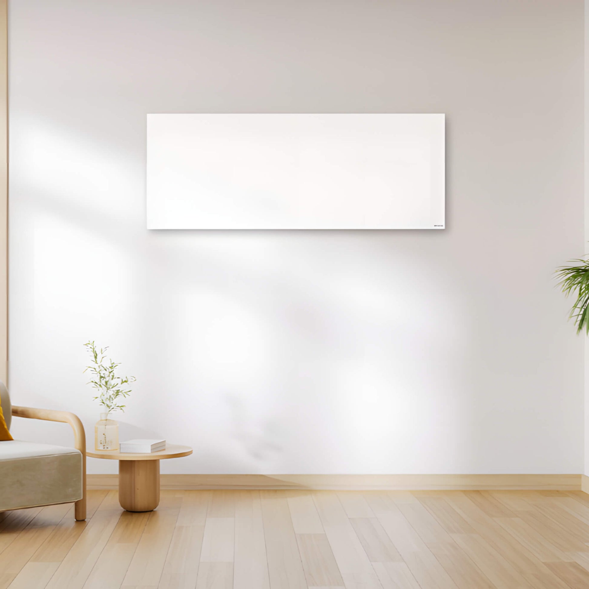 Herschel Select XLS wit infraroodpaneel 1000 watt in groot liggend formaat van 60 bij 155 centimeter in een beige interieur, tegen een muur