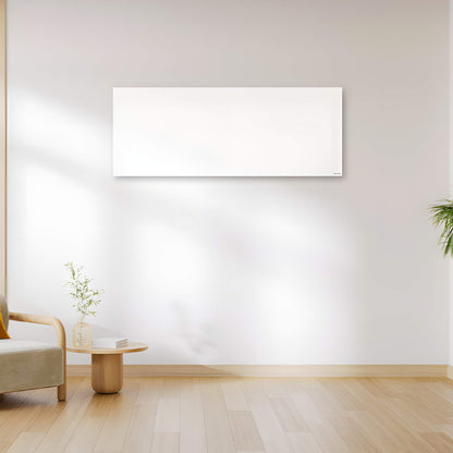 Herschel Select XLS wit infraroodpaneel 1000 watt in groot liggend formaat van 60 bij 155 centimeter in een beige interieur, tegen een muur